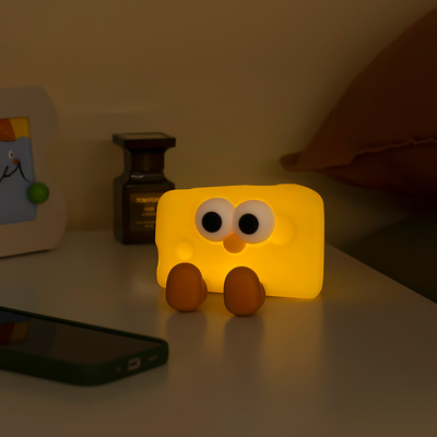 Pabrik Grosir Keju Lembut Silikon Bayi Nursery Lamp Sensitive Tap Control 7 Warna Tunggal Lampu Malam Untuk Anak-anak