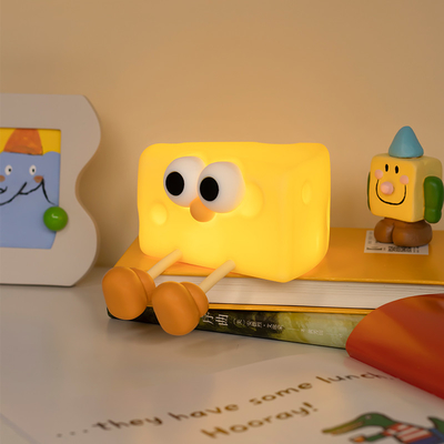 Pabrik Grosir Keju Lembut Silikon Bayi Nursery Lamp Sensitive Tap Control 7 Warna Tunggal Lampu Malam Untuk Anak-anak